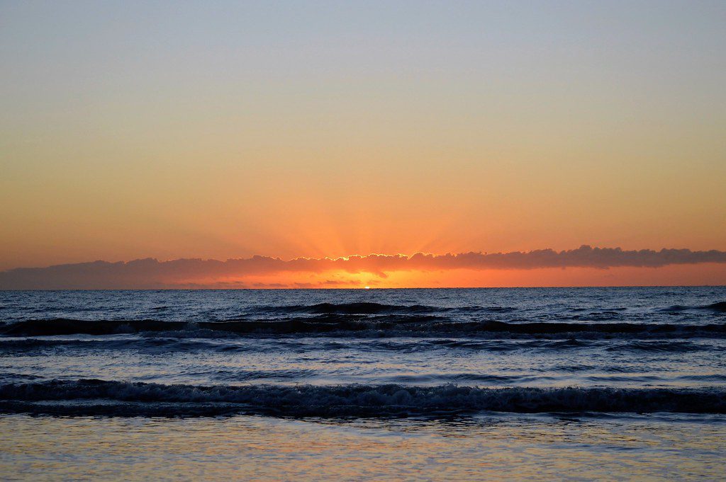 snorkeling in mustang island sunset